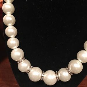 White pearls & ear rings.